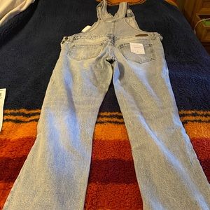 Women’s Jean distressed raw hem cropped overalls